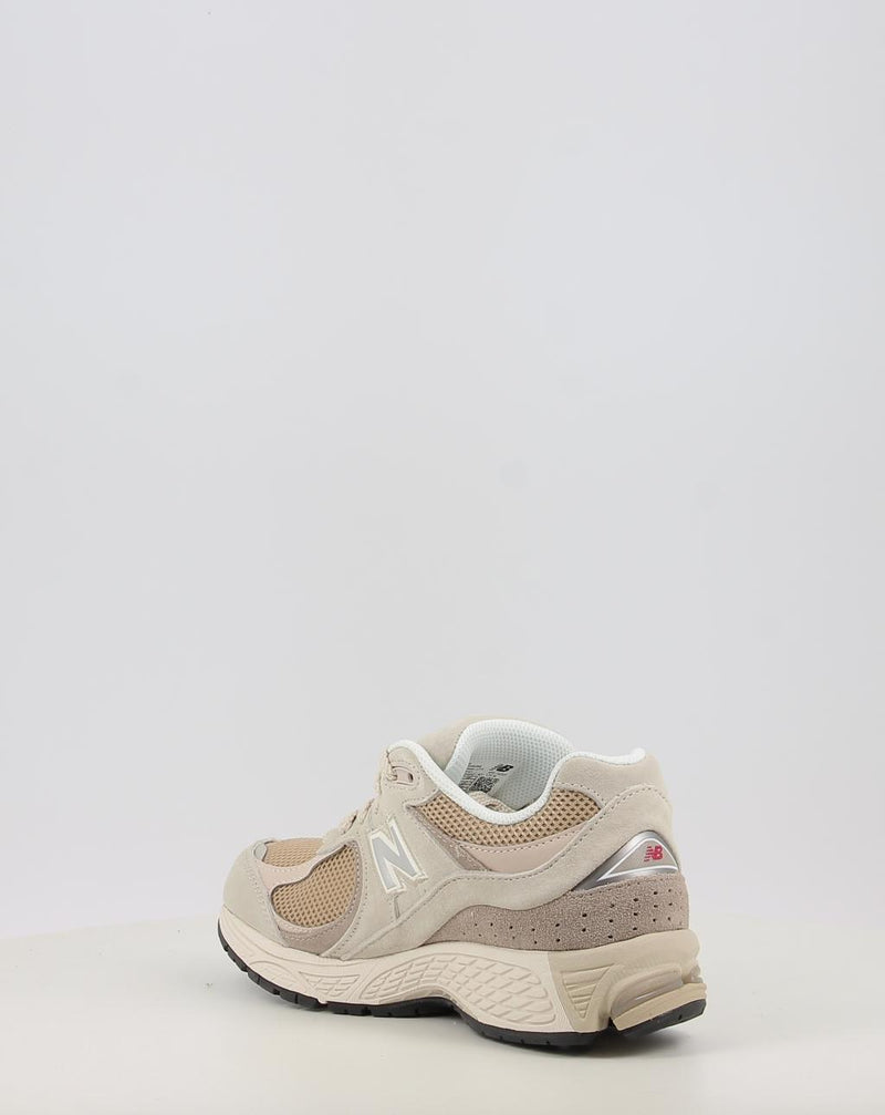 Zapatillas NEW BALANCE U2002RB beig
